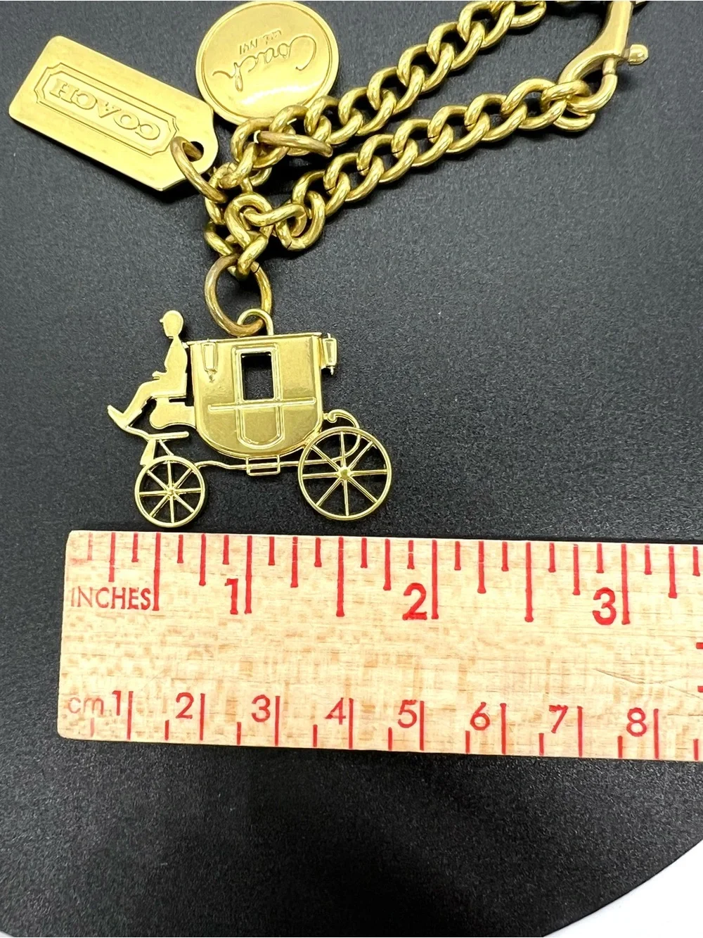 Coach Gold Tone Charm Bracelet with Carriage Charms